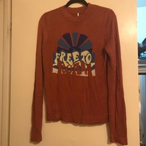 Free people sweater “free to roam”